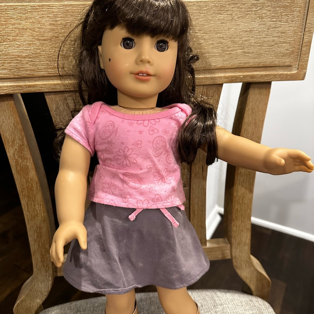 American Doll with handmade beauty mark. Includes dress
